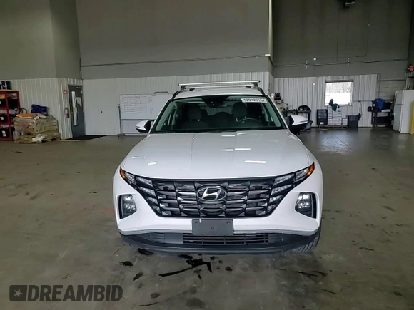2023 Hyundai Tucson SEL with VIN 5NMJBCAE7PH277958, listed as a Copart auction lot 52942715 with 21,520 mi miles and Salvage title. Bid and sale history available at DreamBid. Image 11.
