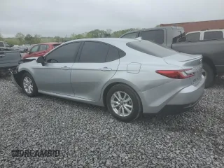 2025 Toyota Camry LE with VIN 4T1DAACKXSU043785, listed as a Copart auction lot 52207785 with 9,410 mi miles and Salvage Title. Bid and sale history available at DreamBid. Image 2.