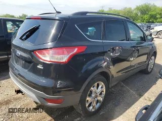 2016 Ford Escape SE z VIN 1FMCU9G95GUC20713, wystawiony jako Copart lot #56719445 z przebiegiem 136 121 mil mil oraz Szkoda całkowita • Salvage title. Historia ofert i sprzedaży dostępna na DreamBid. Obrazek 3.