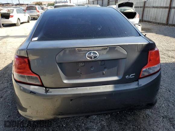2012 Scion tC z VIN JTKJF5C70C3034928, wystawiony jako Copart lot #61272465 z przebiegiem 183 054 mil mil oraz Szkoda całkowita • Salvage title. Historia ofert i sprzedaży dostępna na DreamBid. Obrazek 6.