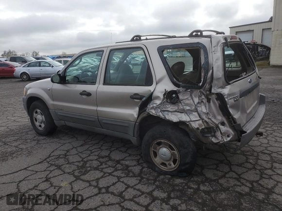 2001 Ford Escape XLS with VIN 1FMYU02111KA37010, listed as a Copart auction lot 52328415 with 312,425 mi miles and Salvage title. Bid and sale history available at DreamBid. Image 2.