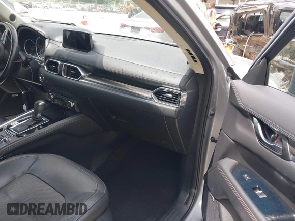 2018 Mazda CX-5 Grand Touring with VIN JM3KFADM6J0339185, listed as a IAAI auction lot 42160763 with 86,312 mi miles and . Bid and sale history available at DreamBid. Image 5.