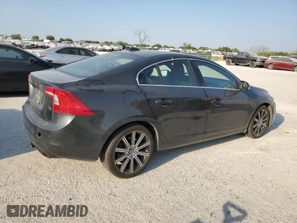 2015 Volvo S60 T6 Drive-E with VIN YV149MFK7F1343313, listed as a Copart auction lot 76279894 with 60,091 mi miles and Salvage Title. Bid and sale history available at carsss.com. Image 3.