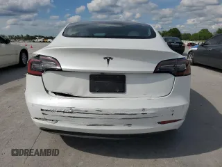 2019 Tesla Model 3 Mid Range z VIN 5YJ3E1EA5KF480188, wystawiony jako Copart lot #53817545 z przebiegiem 121 846 mil mil oraz Szkoda całkowita • Salvage title. Historia ofert i sprzedaży dostępna na DreamBid. Obrazek 6.
