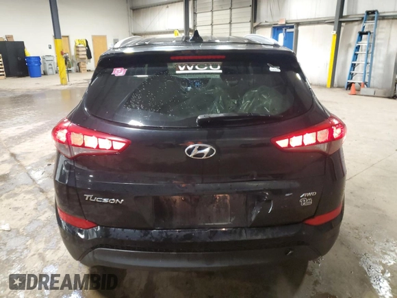 2018 Hyundai Tucson SEL z VIN KM8J3CA44JU690596, wystawiony jako Copart lot #60290475 z przebiegiem 97 512 mil mil oraz Szkoda całkowita • Salvage title. Historia ofert i sprzedaży dostępna na DreamBid. Obrazek 6.