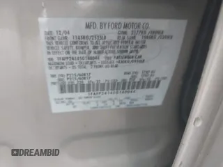 2005 Ford Five Hundred SEL z VIN 1FAFP24145G140044, wystawiony jako IAAI lot #42457383 z przebiegiem 196 564 mil mil oraz . Historia ofert i sprzedaży dostępna na DreamBid. Obrazek 9.