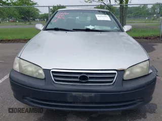 2001 Toyota Camry CE z VIN 4T1BG22K41U847401, wystawiony jako IAAI lot #42275762 z przebiegiem 202 936 mil mil oraz . Historia ofert i sprzedaży dostępna na DreamBid. Obrazek 6.