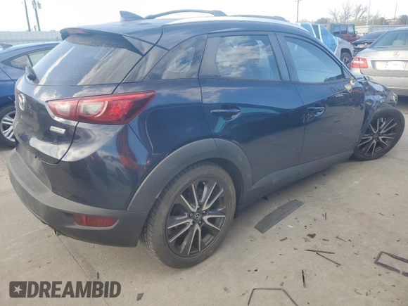 2017 Mazda CX-3 Touring z VIN JM1DKFC7XH0146277, wystawiony jako Copart lot #50199405 z przebiegiem 160 485 mil mil oraz Nie do naprawy. Historia ofert i sprzedaży dostępna na DreamBid. Obrazek 3.