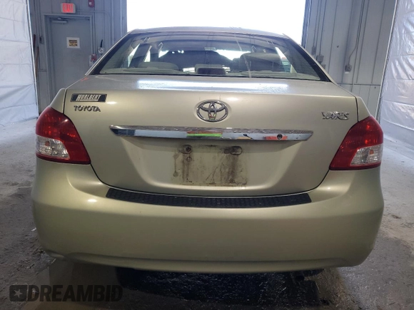 2008 Toyota Yaris z VIN JTDBT923381274987, wystawiony jako Copart lot #52081485 z przebiegiem 188 017 mil mil oraz Szkoda całkowita • Salvage title. Historia ofert i sprzedaży dostępna na DreamBid. Obrazek 6.