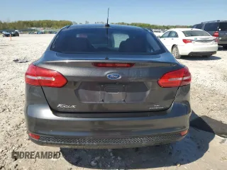 2015 Ford Focus SE with VIN 1FADP3F28FL341666, listed as a Copart auction lot 56338705 with 134,976 mi miles and Clean title. Bid and sale history available at DreamBid. Image 6.
