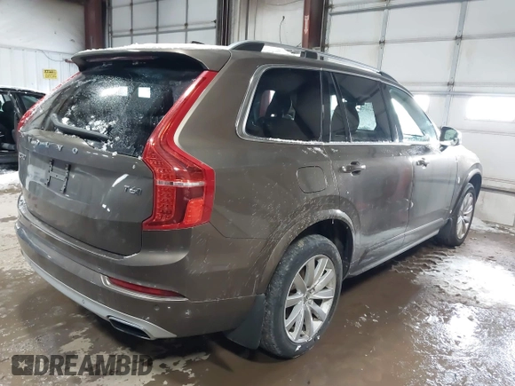2016 Volvo XC90 T6 Momentum with VIN YV4A22PK6G1022376, listed as a IAAI auction lot 41595150 with 128,877 mi miles. Bid and sale history available at carsss.com. Image 4.