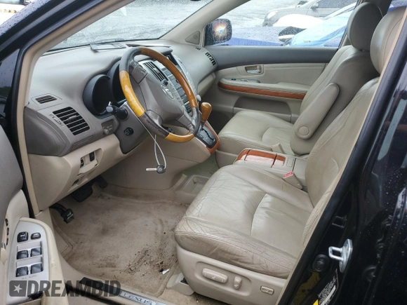 2004 Lexus RX 330 with VIN JTJGA31U840001088, listed as a Copart auction lot 70699244 with 210,716 mi miles and Salvage Title. Bid and sale history available at carsss.com. Image 7.