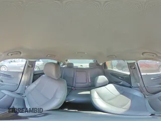 2015 Chevrolet Impala LT z VIN 2G1115SL2F9103854, wystawiony jako Copart lot #56124715 z przebiegiem 184 560 mil mil oraz Szkoda całkowita • Salvage title. Historia ofert i sprzedaży dostępna na DreamBid. Obrazek 14.