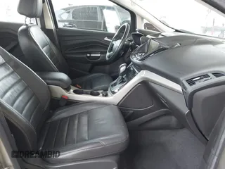 2015 Ford C-Max SEL z VIN 1FADP5CU8FL100255, wystawiony jako IAAI lot #42183172 z przebiegiem 101 606 mil mil oraz . Historia ofert i sprzedaży dostępna na DreamBid. Obrazek 5.