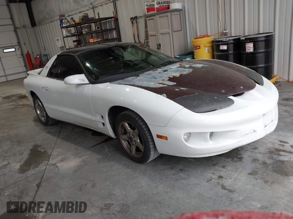 2002 Pontiac Firebird Firebird z VIN 2G2FS22K622160596, wystawiony jako IAAI lot #42068980 z przebiegiem 243 922 mil mil oraz . Historia ofert i sprzedaży dostępna na DreamBid. Obrazek 1.