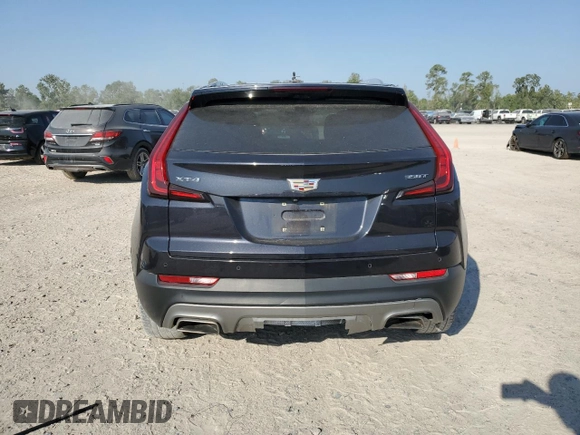 2022 Cadillac XT4 FWD Premium Luxury z VIN 1GYFZCR44NF151123, wystawiony jako Copart lot #50312745 z przebiegiem 46 820 mil mil oraz Szkoda całkowita • Salvage title. Historia ofert i sprzedaży dostępna na DreamBid. Obrazek 6.