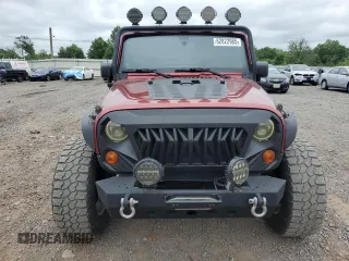 2012 Jeep Wrangler Sport z VIN 1C4AJWAG7CL105511, wystawiony jako Copart lot #62822985 z przebiegiem 137 520 mil mil oraz Czysty tytuł • Clean title. Historia ofert i sprzedaży dostępna na DreamBid. Obrazek 5.