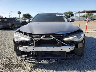 2018 Alfa Romeo Giulia Ti Sport z VIN ZARFAECN7J7576954, wystawiony jako Copart lot #57152095 z przebiegiem 80 235 mil mil oraz Szkoda całkowita • Salvage title. Historia ofert i sprzedaży dostępna na DreamBid. Obrazek 5.