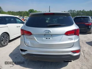 2018 Hyundai Santa Fe 2.4L z VIN 5XYZTDLB9JG513584, wystawiony jako IAAI lot #42031291 z przebiegiem 131 109 mil mil oraz . Historia ofert i sprzedaży dostępna na DreamBid. Obrazek 16.