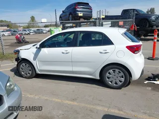 2023 Kia Rio S with VIN 3KPA25AD0PE629868, listed as a IAAI auction lot 41738952 with 25,642 mi miles and . Bid and sale history available at DreamBid. Image 15.