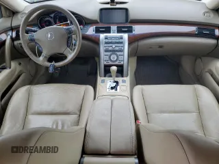 2007 Acura RL Technology z VIN JH4KB16697C002275, wystawiony jako Copart lot #82517284 z przebiegiem 200 857 mil mil oraz Czysty tytuł • Clean title. Historia ofert i sprzedaży dostępna na DreamBid. Obrazek 8.