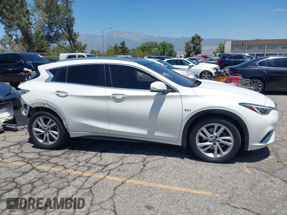 2018 Infiniti QX30 Premium z VIN SJKCH5CP5JA006199, wystawiony jako IAAI lot #42673215 z przebiegiem 107 294 mil mil oraz . Historia ofert i sprzedaży dostępna na DreamBid. Obrazek 14.