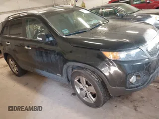 2013 Kia Sorento EX with VIN 5XYKUDA63DG410184, listed as a IAAI auction lot 41416399 with 214,623 mi miles. Bid and sale history available at carsss.com. Image 1.