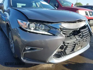 2016 Lexus ES 300h z VIN JTHBW1GG6G2108510, wystawiony jako IAAI lot #41959175 z przebiegiem 142 882 mil mil oraz . Historia ofert i sprzedaży dostępna na DreamBid. Obrazek 18.
