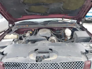 2003 Chevrolet Silverado 1500 LS with VIN 2GCEK19TX31219785, listed as a IAAI auction lot 41716084 with 297,991 mi miles. Bid and sale history available at carsss.com. Image 10.