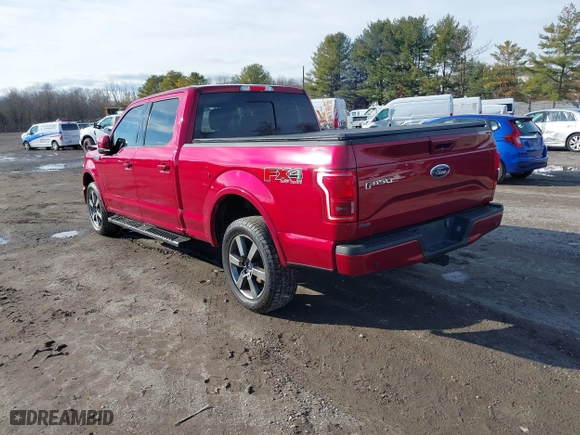 2015 Ford F-150 XLT w/HD Payload Pkg with VIN 1FTFW1EF2FFB76243, listed as a IAAI auction lot 41150866 with 124,478 mi miles. Bid and sale history available at carsss.com. Image 3.