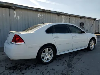 2014 Chevrolet Impala LT z VIN 2G1WB5E34E1147639, wystawiony jako Copart lot #56320445 z przebiegiem 121 243 mil mil oraz Czysty tytuł • Clean title. Historia ofert i sprzedaży dostępna na DreamBid. Obrazek 3.