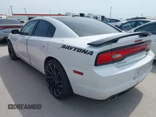 2013 Dodge Charger RT with VIN 2C3CDXCT1DH654737, listed as a IAAI auction lot 42069208 with 226,509 mi miles. Bid and sale history available at carsss.com. Image 3.