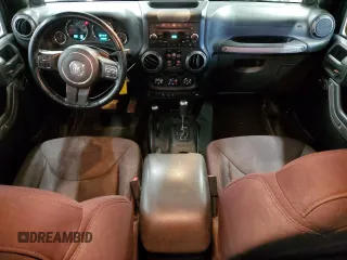 2014 Jeep Wrangler Unlimited Sport with VIN 1C4BJWDG8EL100708, listed as a Copart auction lot 57297245 with 170,862 mi miles and Clean Title. Bid and sale history available at DreamBid. Image 8.
