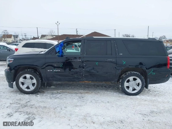 2016 Chevrolet Suburban LTZ with VIN 1GNSKJKC5GR338703, listed as a IAAI auction lot 41405987 with NaN miles. Bid and sale history available at carsss.com. Image 14.