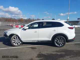2018 Mazda CX-9 Grand Touring with VIN JM3TCBDY6J0200843, listed as a IAAI auction lot 40971233 with 94,770 mi miles. Bid and sale history available at carsss.com. Image 14.
