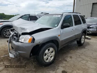2003 Mazda Tribute ES with VIN 4F2CZ06193KM25468, listed as a Copart auction lot 59879914 with 214,393 mi miles and Salvage Title. Bid and sale history available at carsss.com. Image 1.