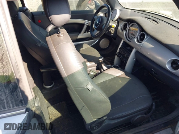 2006 MINI Convertible with VIN WMWRF33586TF64534, listed as a IAAI auction lot 41484453 with 180,748 mi miles and . Bid and sale history available at DreamBid. Image 5.