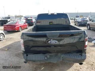 2020 Ford F-150 XL with VIN 1FTEW1E59LKE70874, listed as a IAAI auction lot 41479554 with 104,957 mi miles. Bid and sale history available at carsss.com. Image 16.