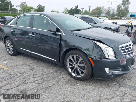 2013 Cadillac XTS Luxury with VIN 2G61P5S33D9215214, listed as a IAAI auction lot 42170402 with 132,045 mi miles and . Bid and sale history available at DreamBid. Image 1.