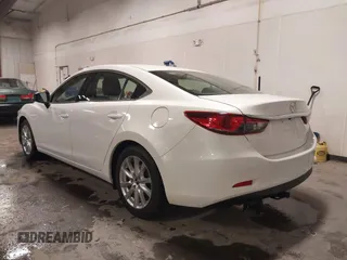2016 Mazda Mazda6 i Sport with VIN JM1GJ1U54G1473671, listed as a IAAI auction lot 41576038 with 88,386 mi miles. Bid and sale history available at carsss.com. Image 3.