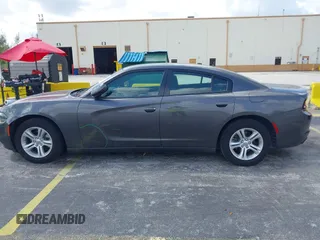 2022 Dodge Charger SXT with VIN 2C3CDXBG4NH248389, listed as a IAAI auction lot 42144728 with 54,132 mi miles and . Bid and sale history available at DreamBid. Image 14.
