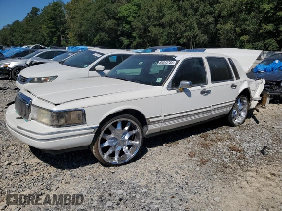 1994 Lincoln Town Car Signature z VIN 1LNLM82W7RY781174, wystawiony jako Copart lot #69642754 z przebiegiem 149 185 mil mil oraz Szkoda całkowita • Salvage title. Historia ofert i sprzedaży dostępna na DreamBid. Obrazek 1.