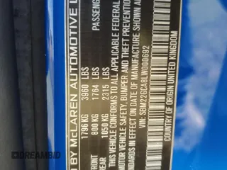 2020 McLaren GT z VIN SBM22GCA8LW000692, wystawiony jako Copart lot #44749324 z przebiegiem 18 911 mil mil oraz Nie do naprawy. Historia ofert i sprzedaży dostępna na DreamBid. Obrazek 12.