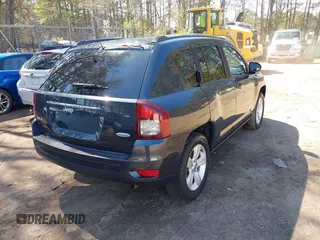 2014 Jeep Compass Latitude with VIN 1C4NJDEB3ED816351, listed as a IAAI auction lot 41882146 with 129,074 mi miles. Bid and sale history available at carsss.com. Image 4.