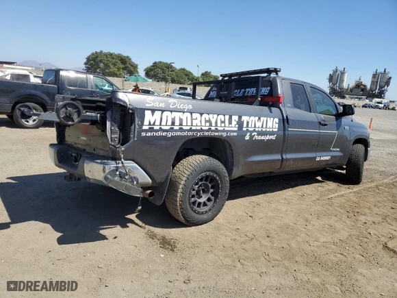 2014 Toyota Tundra 4WD Truck SR with VIN 5TFCY5F17EX016164, listed as a Copart auction lot 69178594 with 379,751 mi miles and Salvage Title. Bid and sale history available at carsss.com. Image 3.