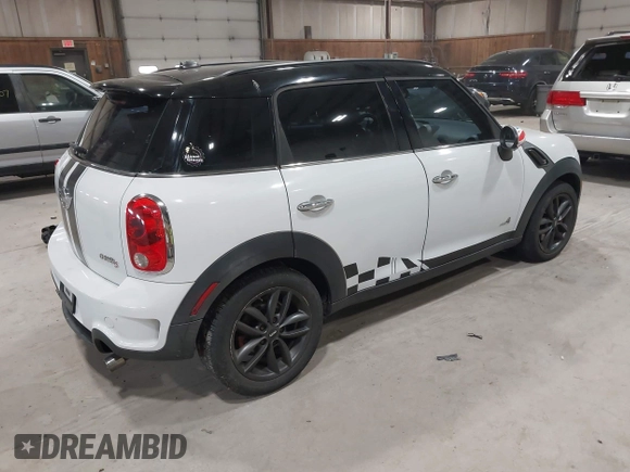 2012 MINI Countryman S with VIN WMWZC5C58CWL60067, listed as a IAAI auction lot 42081725 with 104,397 mi miles and . Bid and sale history available at DreamBid. Image 4.