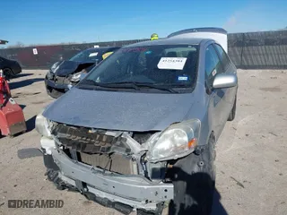 2012 Toyota Yaris with VIN JTDBT4K35CL038860, listed as a IAAI auction lot 41254384 with 161,536 mi miles. Bid and sale history available at carsss.com. Image 2.