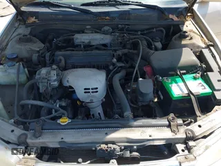 2000 Toyota Camry CE z VIN 4T1BG22K5YU972322, wystawiony jako IAAI lot #42098429 z przebiegiem 122 351 mil mil oraz . Historia ofert i sprzedaży dostępna na DreamBid. Obrazek 10.