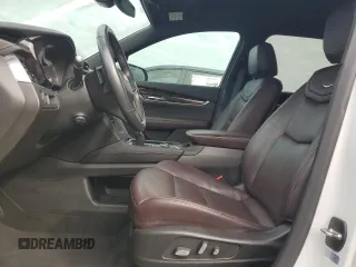 2021 Cadillac XT6 Premium Luxury z VIN 1GYKPCRSXMZ230618, wystawiony jako Copart lot #81022824 z przebiegiem Nie podano mil oraz Szkoda całkowita • Salvage title. Historia ofert i sprzedaży dostępna na DreamBid. Obrazek 7.