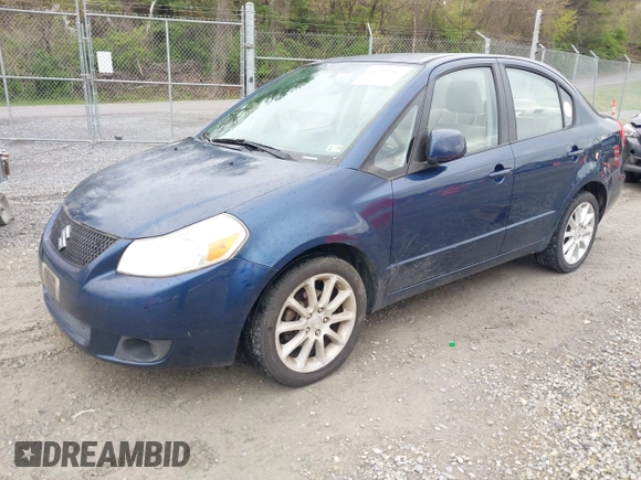 2011 Suzuki SX4 LE with VIN JS2YC5A23B6304713, listed as a IAAI auction lot 41997287 with 114,024 mi miles. Bid and sale history available at carsss.com. Image 17.
